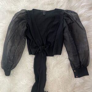 Black crop top. Ties in the front